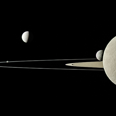 Four of Saturn's moon (from left to right): Pandora, Enceladus, Rhea and Mimas. Saturn's F ring is also shown. 
