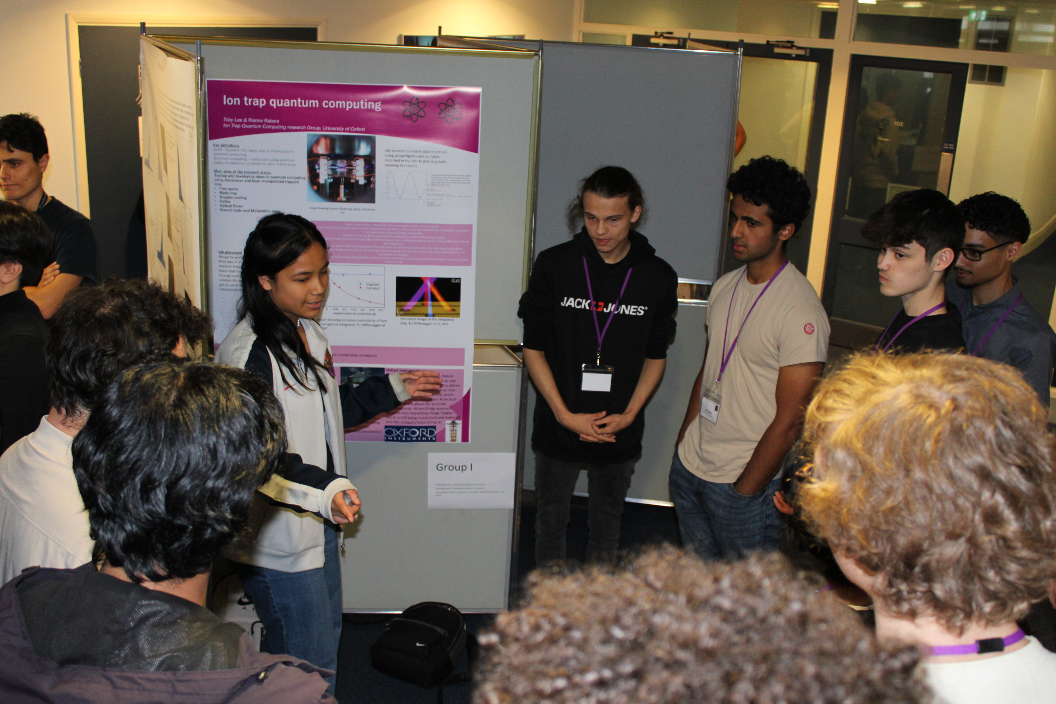 Students presenting at poster presentation