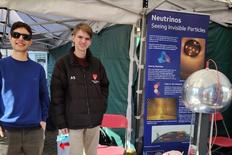 Students at stand for ATOM event