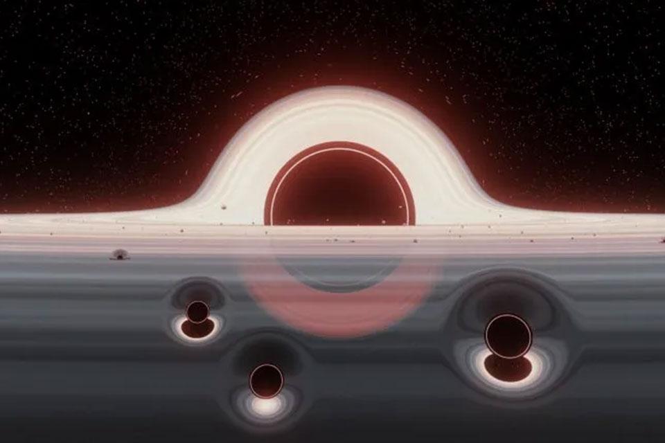 Illustration of a swarm of smaller black holes in a gas disk rotating around a giant black hole