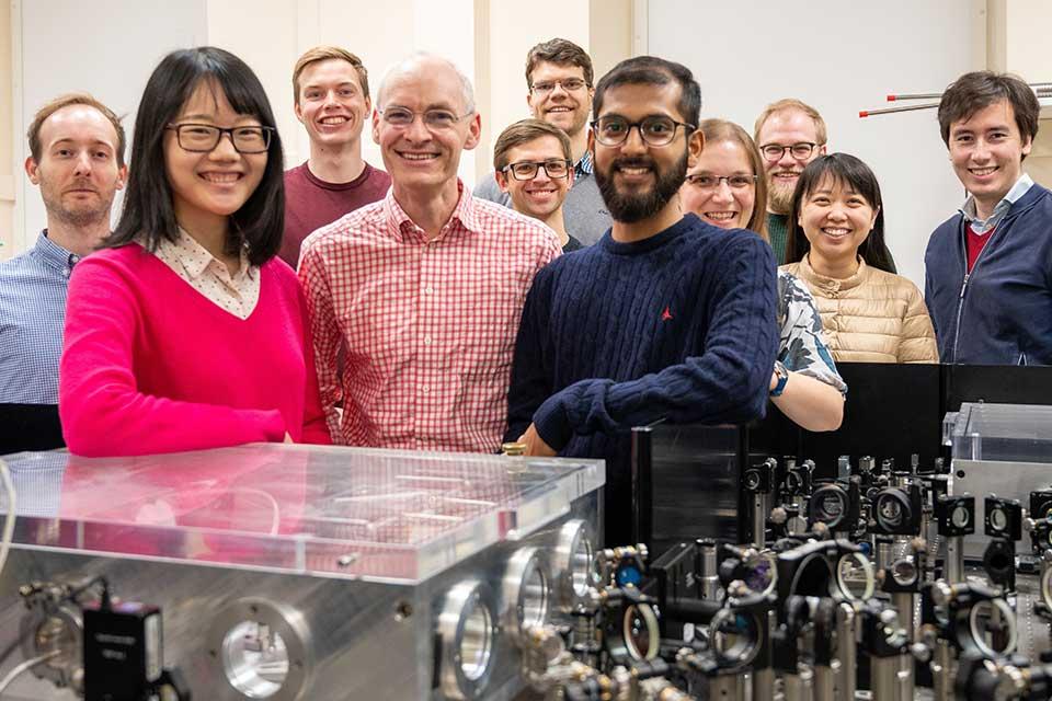 Professor Michael Johnston, centre, with his group at Oxford