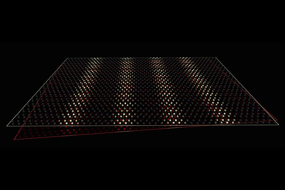 Illustration of a one dimensional moire pattern that emerges on twisting a two-dimensional crystal