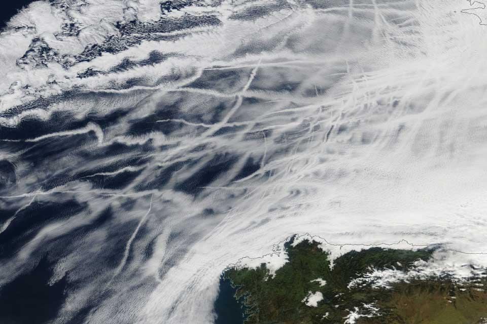 Ship tracks arise when aerosol emissions from ships enter clouds and make them brighter. From satellite, they appear as long lines, like here in the Bay of Biscay, north of Spain.