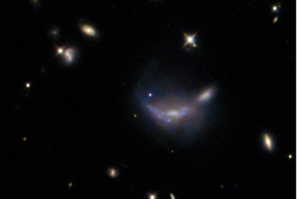 Type Ia supernova visible as a blue dot at the centre of this NASA/ESA Hubble Space Telescope image