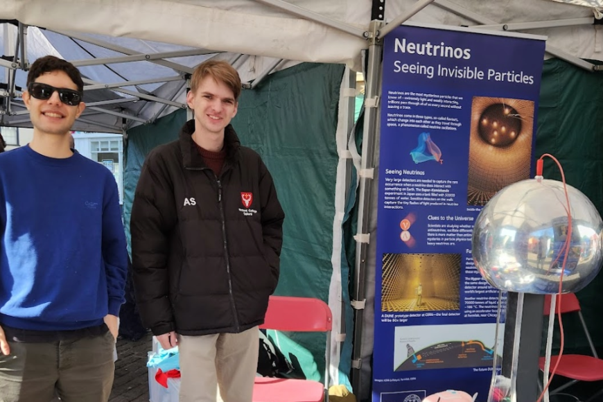 Students at stand for ATOM event