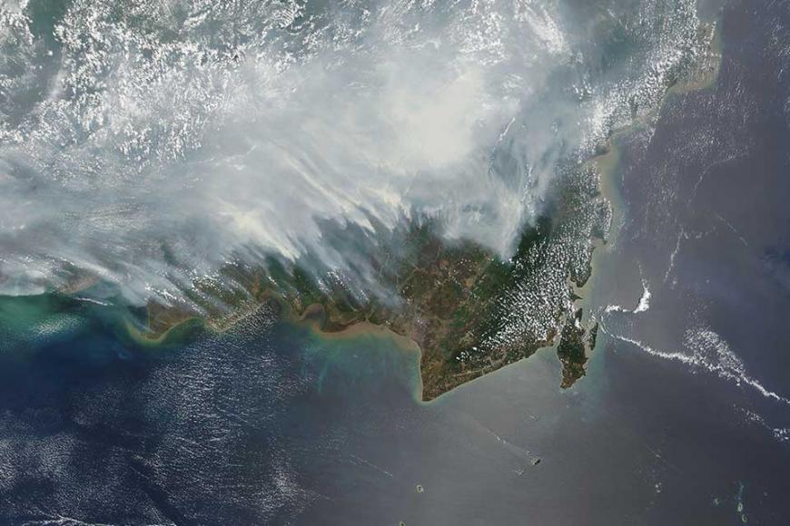Satellite image of smoke plumes over Kalimantan, Indonesia during the massive peat fires of October 2015