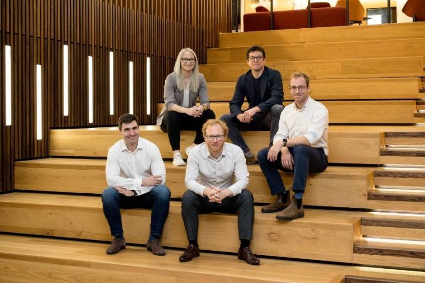 The QFX team photographed in the Department of Physics