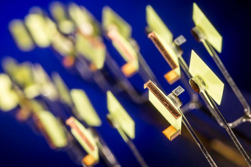 A close-up of the experimental target, consisting of two foils and a pair of grids, held together by cylindrical shields. Each target is about the size of a penny. They were carefully designed and machined to produce a turbulent plasma at conditions never reached before.