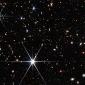 NASA’s James Webb Space Telescope’s NIRCam (Near-Infrared Camera) was able to detect the host galaxy of the fast radio burst called FRB 20240304B, whose location is shown by the white cross.