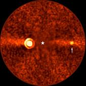 This image, taken with ESO’s Very Large Telescope (VLT) shows Beta Pictoris d, a new planet found orbiting the star Beta Pictoris. The star is at the centre of the frame, and was subtracted when processing the data, revealing the environment around it. The new planet, indicated with an arrow, is the third one found around this star. The other two are Beta Pictoris b –– the bright source to the left, and Beta Pictoris c, orbiting much closer to the star and not seen here.