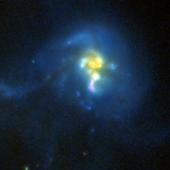 Image of an ultraluminous infrared galaxy taken  by the Advanced Camera for Surveys (ACS) and the revived Near Infrared Camera and Multi-Object Spectrometer (NICMOS).