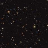 An infrared image taken as part of the JADES programme (the JWST Advanced Deep Extragalactic Survey), showing a portion of an area of the sky known as GOODS-South where the observation in the study was made.