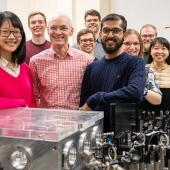 Professor Michael Johnston, centre, with his group at Oxford