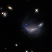 Type Ia supernova visible as a blue dot at the centre of this NASA/ESA Hubble Space Telescope image