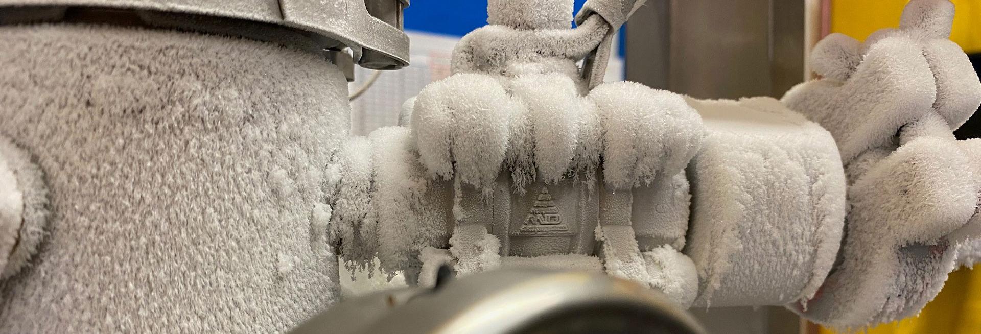 Close-up of frozen pipes in the cryomagnetics facility, Department of Physics, University of Oxford