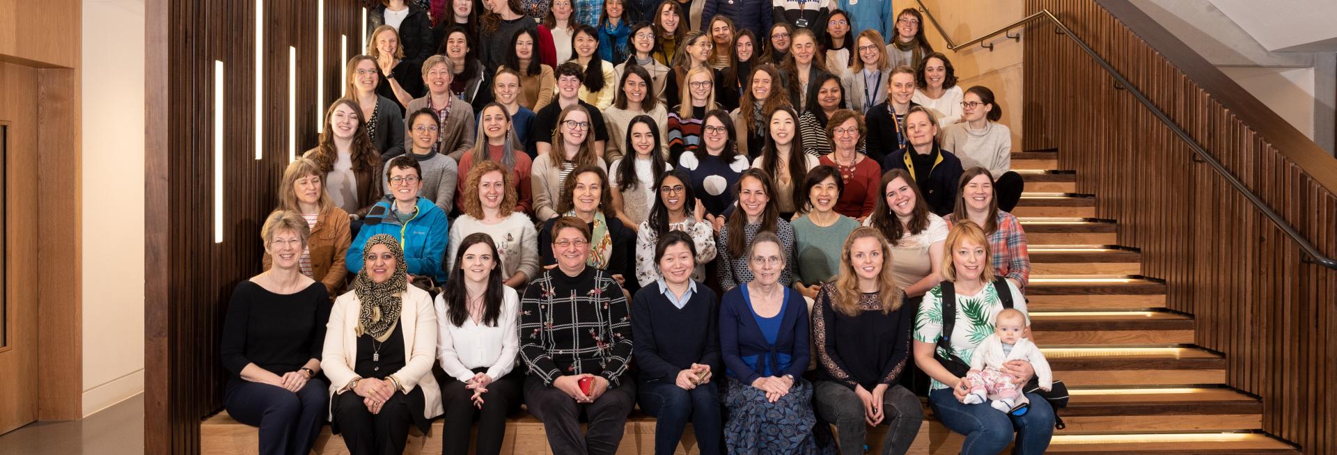 a photo of forty women in the physics department