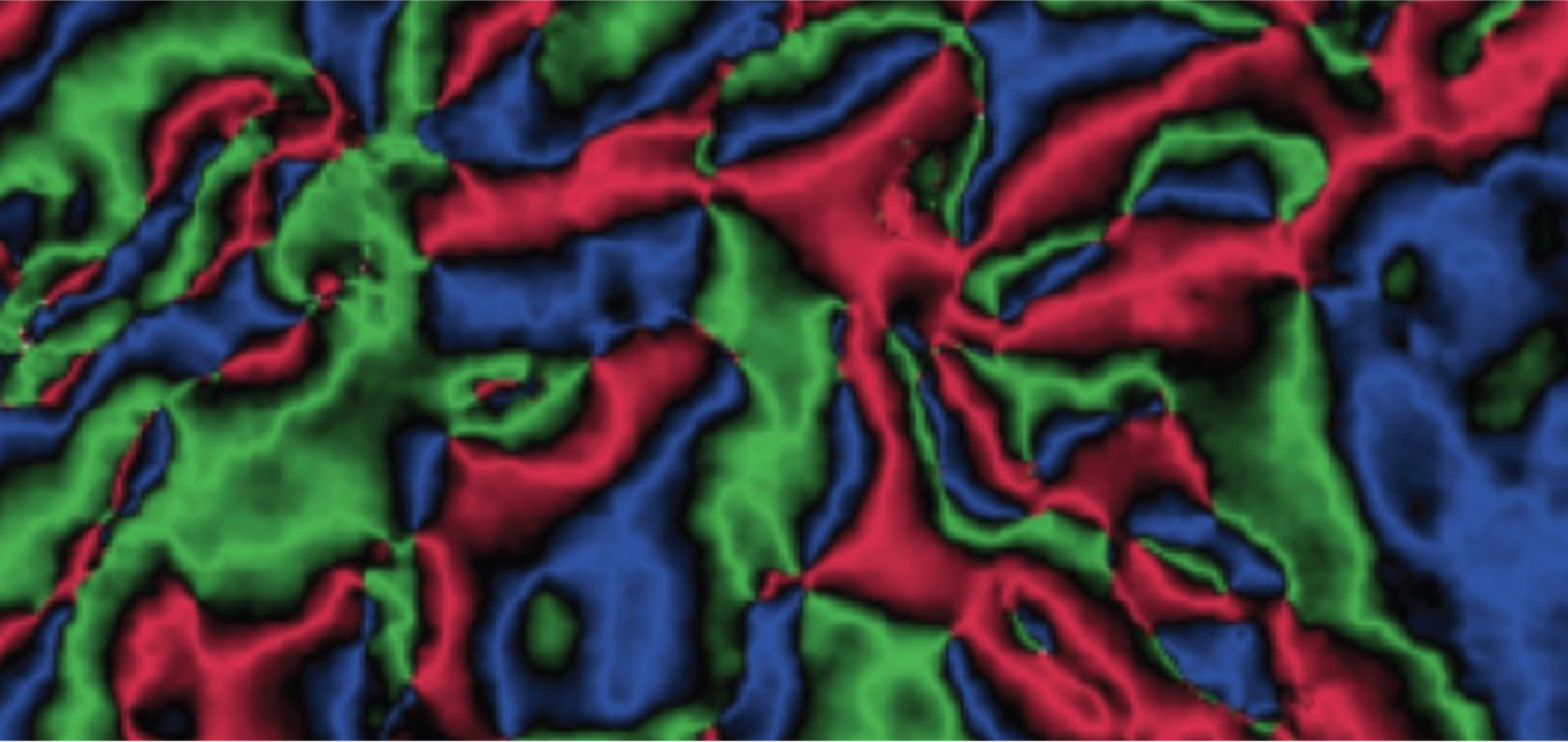 Magnetic vortices in Fe2O3