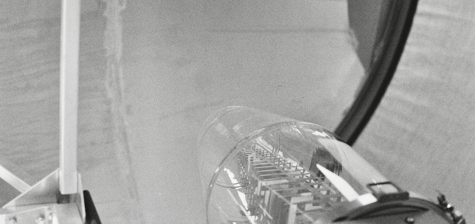 Black and white film photo of the inside of a radio telescope