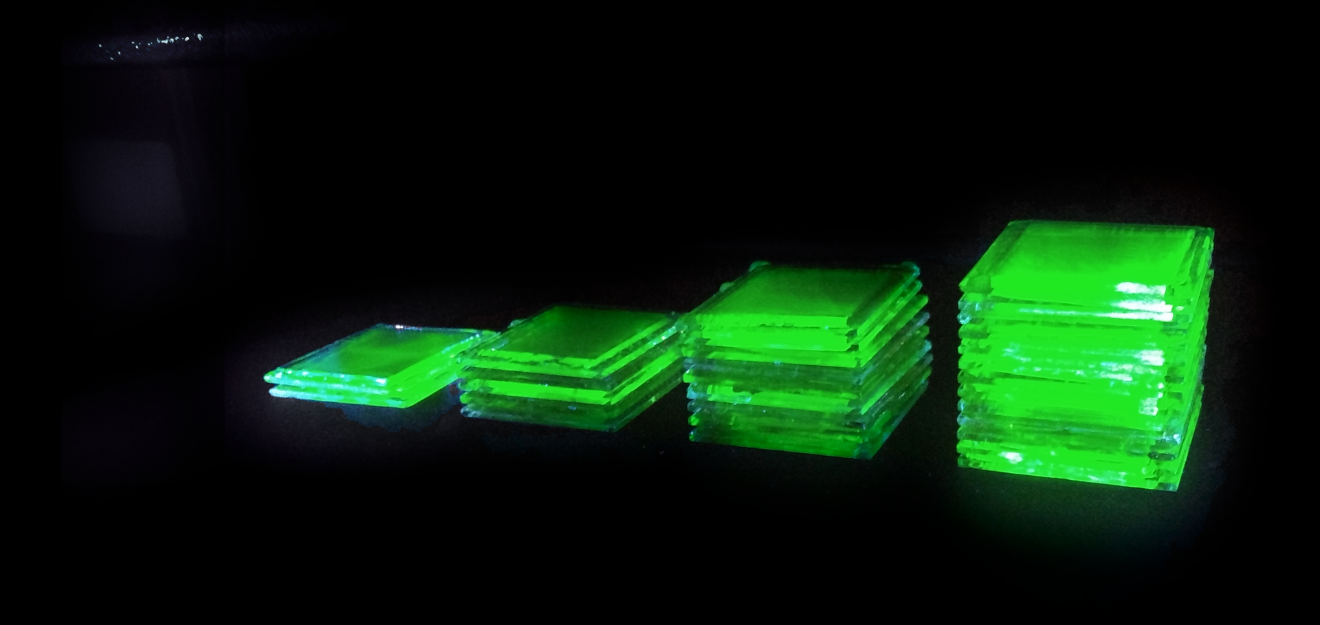 Samples of CsPbBr3 films exhibiting photoluminescence in the green.