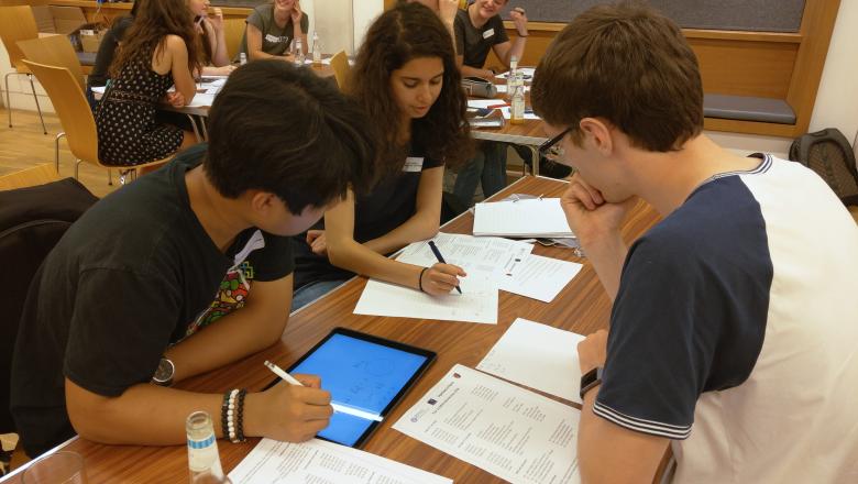 Students work on physics problems