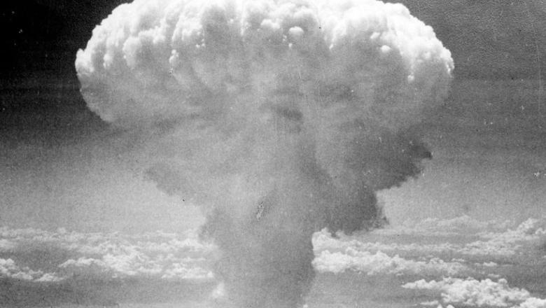 The image shows part of the full image that shows the atomic cloud rising over Nagasaki, Japan. By Charles Levy.