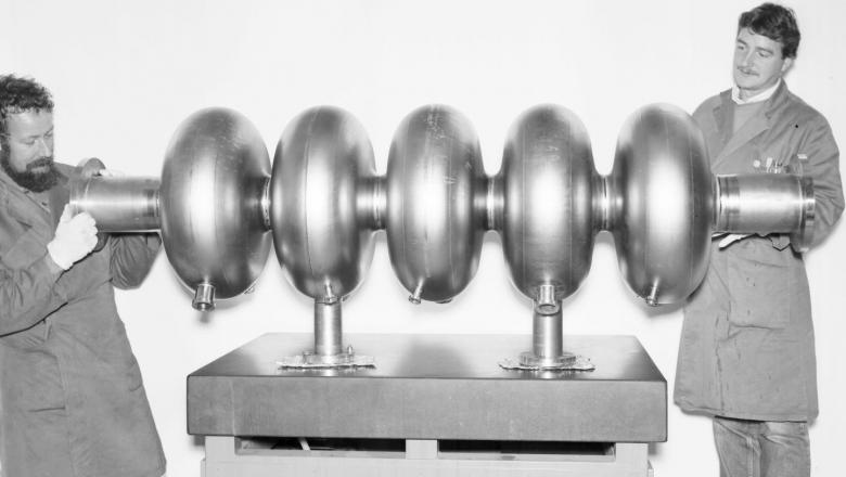 A picture of an early 5 celled superconducting RF cavity.