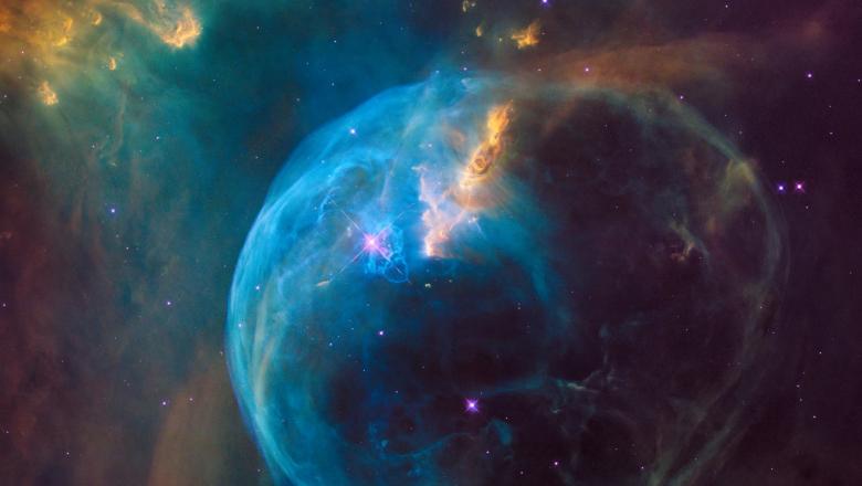 a photo by nasa of a bubble-shaped nebula