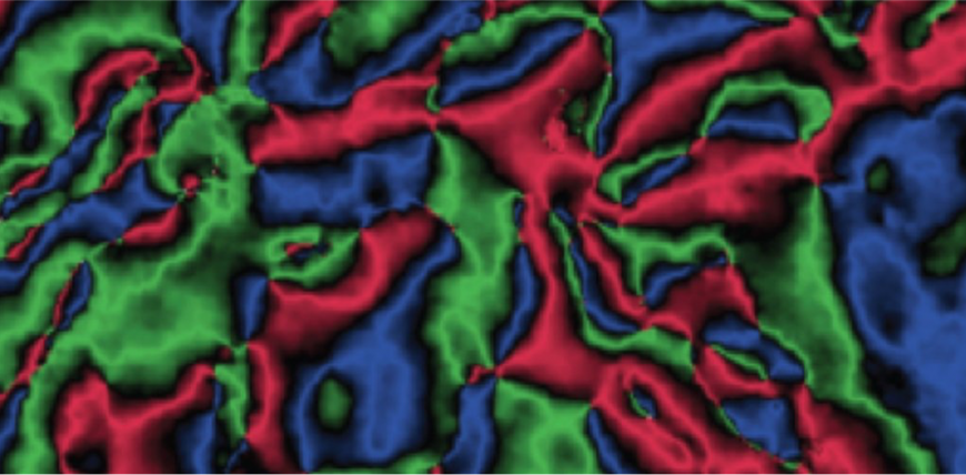 Magnetic vortices in Fe2O3