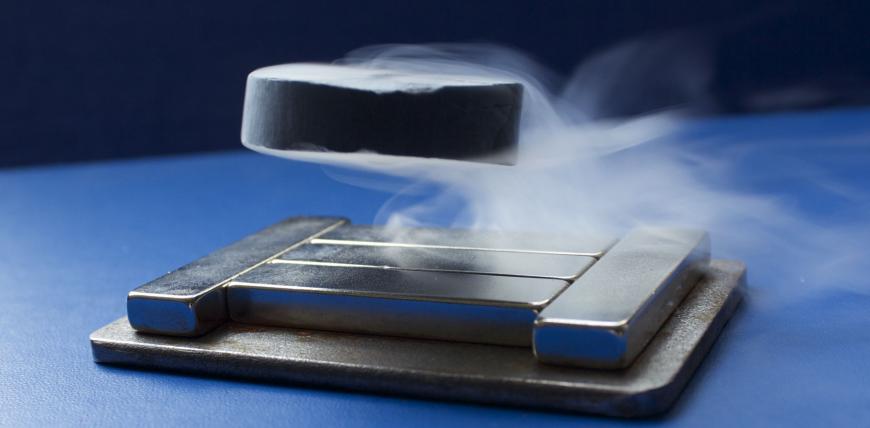 High temperature superconducting disk levitating above a slab of permanent magnets