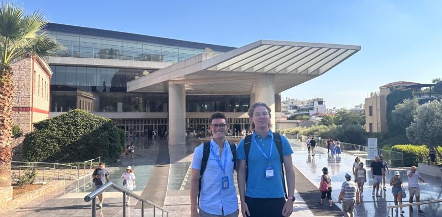 Alex and Bradley standing outside the Acropolis Museum