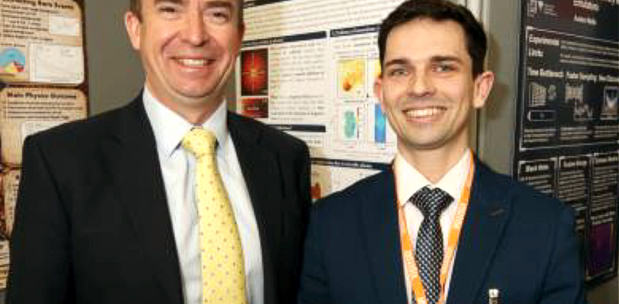 DPhil research Thomas Vincent alongside his local MP Calum Miller.